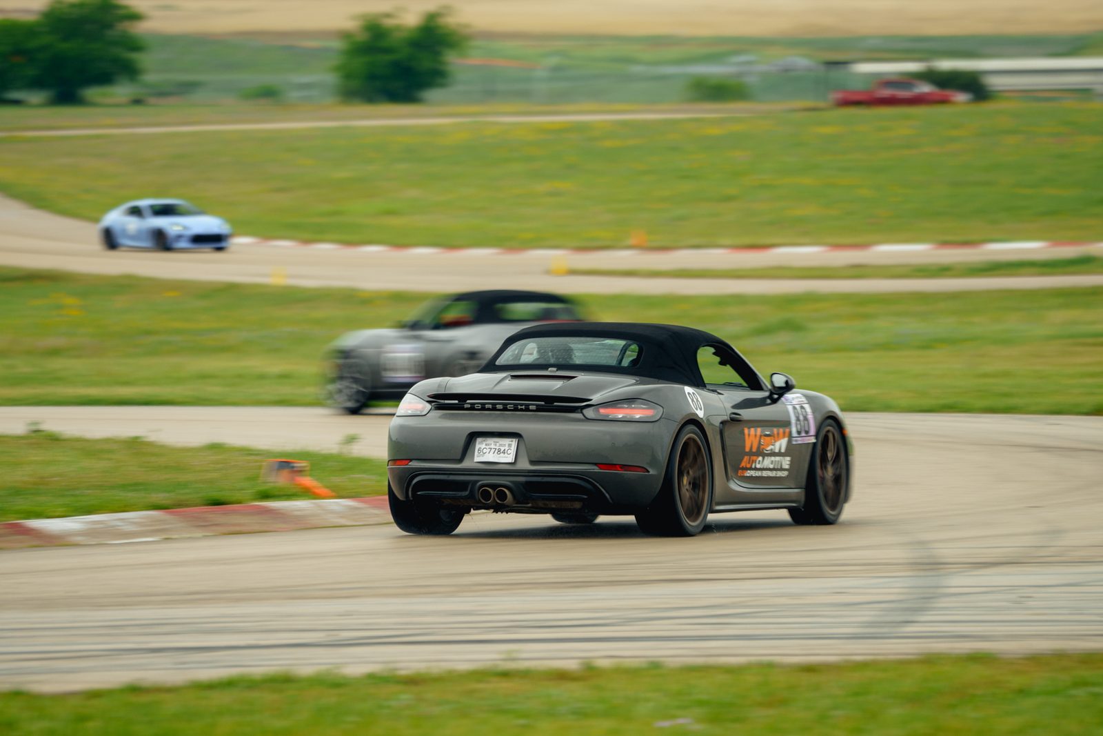 APEX Lap Attack Porsche driving at speed on track